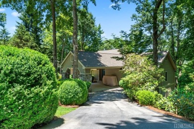 Partake in the mountain lifestyle with this 3 bedroom, 4.5 bath on Lake Toxaway Country Club in North Carolina - for sale on GolfHomes.com, golf home, golf lot