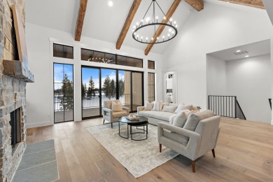 Strategically situated between Lake Cascade and The Village at on Osprey Meadows at Tamarack Resort in Idaho - for sale on GolfHomes.com, golf home, golf lot