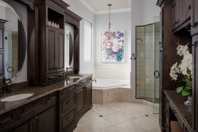 Experience refined lakefront living in this exceptional estate on Isleworth Golf and Country Club in Florida - for sale on GolfHomes.com, golf home, golf lot