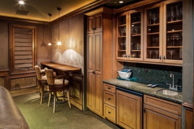 Experience refined lakefront living in this exceptional estate on Isleworth Golf and Country Club in Florida - for sale on GolfHomes.com, golf home, golf lot