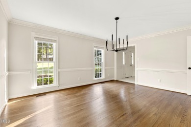 Exquisite traditional brick estate in the prestigious North on North Ridge Country Club in North Carolina - for sale on GolfHomes.com, golf home, golf lot