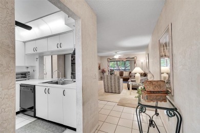 Sunrise Lakes Community Offers this Active 55+ Lakefront Condo on Sunrise Lakes Phase IV Golf Course in Florida - for sale on GolfHomes.com, golf home, golf lot