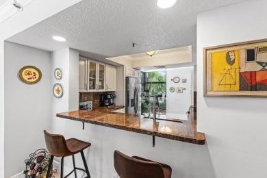 Beautifully updated three bedroom condo in an excellent Central on  in Florida - for sale on GolfHomes.com, golf home, golf lot