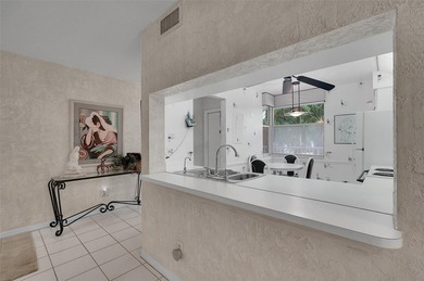 JUST REDUCED! WATERFRONT! Sunrise Lakes Community Offers this on Sunrise Lakes Phase IV Golf Course in Florida - for sale on GolfHomes.com, golf home, golf lot