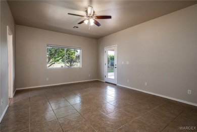 ***This gorgeous home backs up to the 7th hole of Cerbat Cliffs on Cerbat Cliffs Golf Course in Arizona - for sale on GolfHomes.com, golf home, golf lot