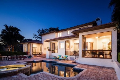 Experience refined lakefront living in this exceptional estate on Isleworth Golf and Country Club in Florida - for sale on GolfHomes.com, golf home, golf lot