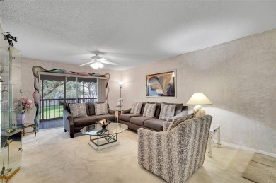 Sunrise Lakes Community Offers this Active 55+ Lakefront Condo on Sunrise Lakes Phase IV Golf Course in Florida - for sale on GolfHomes.com, golf home, golf lot