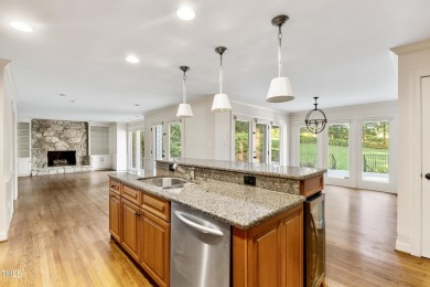Exquisite traditional brick estate in the prestigious North on North Ridge Country Club in North Carolina - for sale on GolfHomes.com, golf home, golf lot