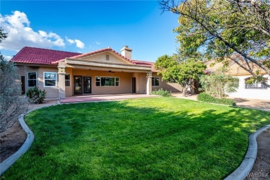 ***This gorgeous home backs up to the 7th hole of Cerbat Cliffs on Cerbat Cliffs Golf Course in Arizona - for sale on GolfHomes.com, golf home, golf lot