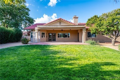 ***This gorgeous home backs up to the 7th hole of Cerbat Cliffs on Cerbat Cliffs Golf Course in Arizona - for sale on GolfHomes.com, golf home, golf lot