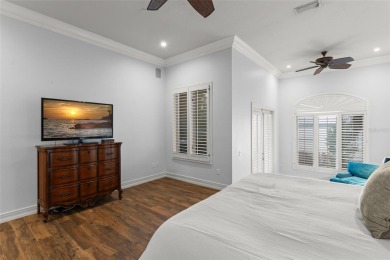 Motivated Seller - Experience refined lakefront living in this on Isleworth Golf and Country Club in Florida - for sale on GolfHomes.com, golf home, golf lot