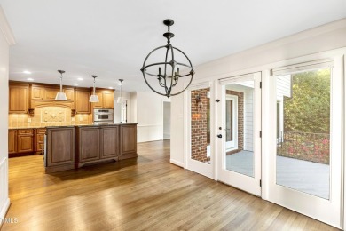 Exquisite traditional brick estate in the prestigious North on North Ridge Country Club in North Carolina - for sale on GolfHomes.com, golf home, golf lot