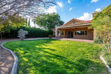 ***This gorgeous home backs up to the 7th hole of Cerbat Cliffs on Cerbat Cliffs Golf Course in Arizona - for sale on GolfHomes.com, golf home, golf lot