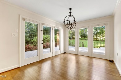 Exquisite traditional brick estate in the prestigious North on North Ridge Country Club in North Carolina - for sale on GolfHomes.com, golf home, golf lot