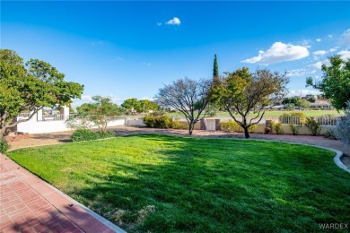 ***This gorgeous home backs up to the 7th hole of Cerbat Cliffs on Cerbat Cliffs Golf Course in Arizona - for sale on GolfHomes.com, golf home, golf lot