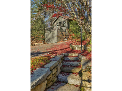 This enchanting single-level mountain home at 630 Cobb Road on Highlands Country Club in North Carolina - for sale on GolfHomes.com, golf home, golf lot