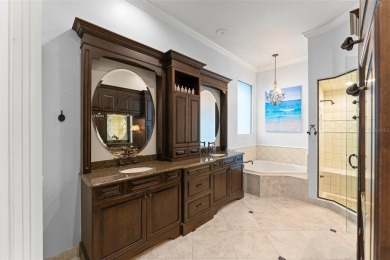 Motivated Seller - Experience refined lakefront living in this on Isleworth Golf and Country Club in Florida - for sale on GolfHomes.com, golf home, golf lot