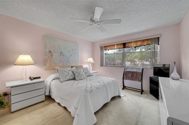 Sunrise Lakes Community Offers this Active 55+ Lakefront Condo on Sunrise Lakes Phase IV Golf Course in Florida - for sale on GolfHomes.com, golf home, golf lot