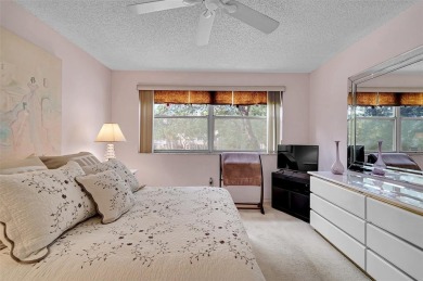 Sunrise Lakes Community Offers this Active 55+ Lakefront Condo on Sunrise Lakes Phase IV Golf Course in Florida - for sale on GolfHomes.com, golf home, golf lot
