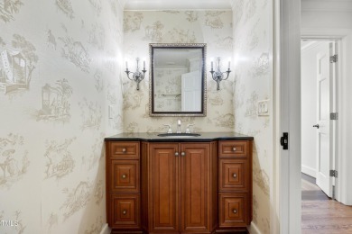 Exquisite traditional brick estate in the prestigious North on North Ridge Country Club in North Carolina - for sale on GolfHomes.com, golf home, golf lot