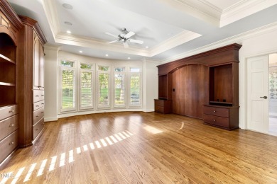 Exquisite traditional brick estate in the prestigious North on North Ridge Country Club in North Carolina - for sale on GolfHomes.com, golf home, golf lot