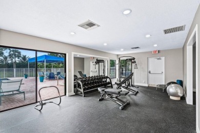 Beautifully updated three bedroom condo in an excellent Central on  in Florida - for sale on GolfHomes.com, golf home, golf lot