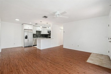 Fully remodeled and move-in ready -- bring on the offers! This on Highland Lakes Executive Golf Course in Florida - for sale on GolfHomes.com, golf home, golf lot