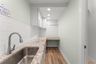 Motivated Seller - Experience refined lakefront living in this on Isleworth Golf and Country Club in Florida - for sale on GolfHomes.com, golf home, golf lot