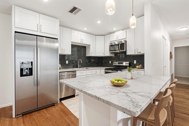 Fully remodeled and move-in ready -- bring on the offers! This on Highland Lakes Executive Golf Course in Florida - for sale on GolfHomes.com, golf home, golf lot