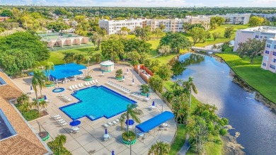 Sunrise Lakes Community Offers this Active 55+ Lakefront Condo on Sunrise Lakes Phase IV Golf Course in Florida - for sale on GolfHomes.com, golf home, golf lot