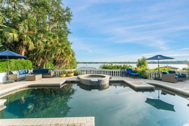Motivated Seller - Experience refined lakefront living in this on Isleworth Golf and Country Club in Florida - for sale on GolfHomes.com, golf home, golf lot