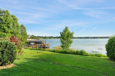 Motivated Seller - Experience refined lakefront living in this on Isleworth Golf and Country Club in Florida - for sale on GolfHomes.com, golf home, golf lot