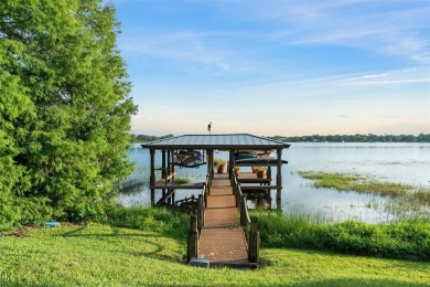 Motivated Seller - Experience refined lakefront living in this on Isleworth Golf and Country Club in Florida - for sale on GolfHomes.com, golf home, golf lot