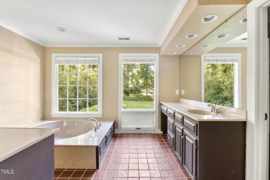 Exquisite traditional brick estate in the prestigious North on North Ridge Country Club in North Carolina - for sale on GolfHomes.com, golf home, golf lot