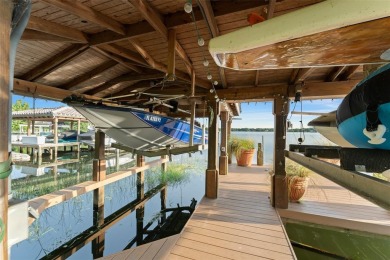 Motivated Seller - Experience refined lakefront living in this on Isleworth Golf and Country Club in Florida - for sale on GolfHomes.com, golf home, golf lot