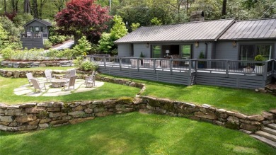 This enchanting single-level mountain home at 630 Cobb Road on Highlands Country Club in North Carolina - for sale on GolfHomes.com, golf home, golf lot