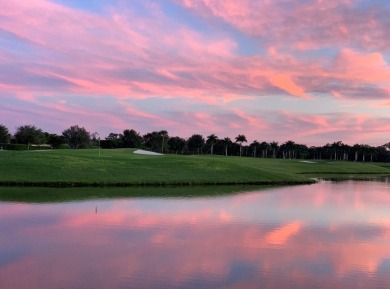 Enjoy truly incredible sunsets over the picturesque pond and on Heritage Landing Golf  in Florida - for sale on GolfHomes.com, golf home, golf lot