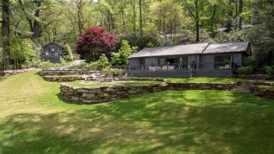 This enchanting single-level mountain home at 630 Cobb Road on Highlands Country Club in North Carolina - for sale on GolfHomes.com, golf home, golf lot