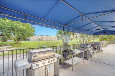 Sunrise Lakes Community Offers this Active 55+ Lakefront Condo on Sunrise Lakes Phase IV Golf Course in Florida - for sale on GolfHomes.com, golf home, golf lot