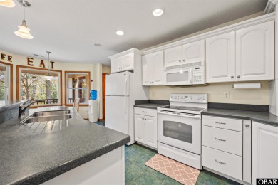 Don't miss out on this incredible canal-front home situated on on Duck Woods Country Club in North Carolina - for sale on GolfHomes.com, golf home, golf lot