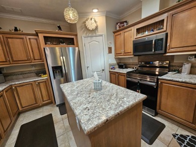This meticulously cared-for home is as beautiful inside as it is on Big Cypress Golf and Country Club in Florida - for sale on GolfHomes.com, golf home, golf lot