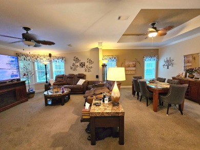 This meticulously cared-for home is as beautiful inside as it is on Big Cypress Golf and Country Club in Florida - for sale on GolfHomes.com, golf home, golf lot