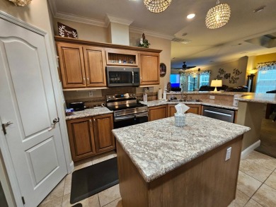 This meticulously cared-for home is as beautiful inside as it is on Big Cypress Golf and Country Club in Florida - for sale on GolfHomes.com, golf home, golf lot