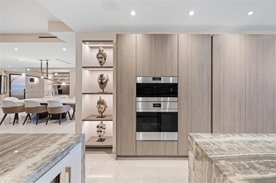 A triumph of design and innovation--crafted with precision on Turnberry Isle Resort and Club in Florida - for sale on GolfHomes.com, golf home, golf lot