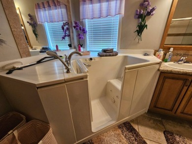 This meticulously cared-for home is as beautiful inside as it is on Big Cypress Golf and Country Club in Florida - for sale on GolfHomes.com, golf home, golf lot