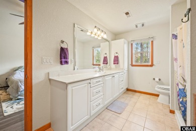 Don't miss out on this incredible canal-front home situated on on Duck Woods Country Club in North Carolina - for sale on GolfHomes.com, golf home, golf lot