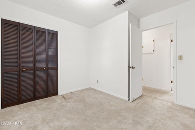 CURRENTLY UNDER CONTRACT, SELLER WILL CONSIDER BACKUP OFFERS on Panama Country Club in Florida - for sale on GolfHomes.com, golf home, golf lot