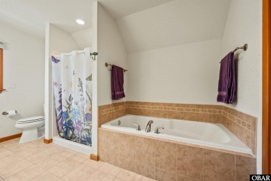 Don't miss out on this incredible canal-front home situated on on Duck Woods Country Club in North Carolina - for sale on GolfHomes.com, golf home, golf lot