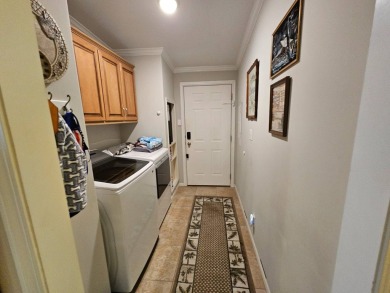 This meticulously cared-for home is as beautiful inside as it is on Big Cypress Golf and Country Club in Florida - for sale on GolfHomes.com, golf home, golf lot