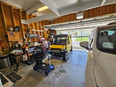 This meticulously cared-for home is as beautiful inside as it is on Big Cypress Golf and Country Club in Florida - for sale on GolfHomes.com, golf home, golf lot